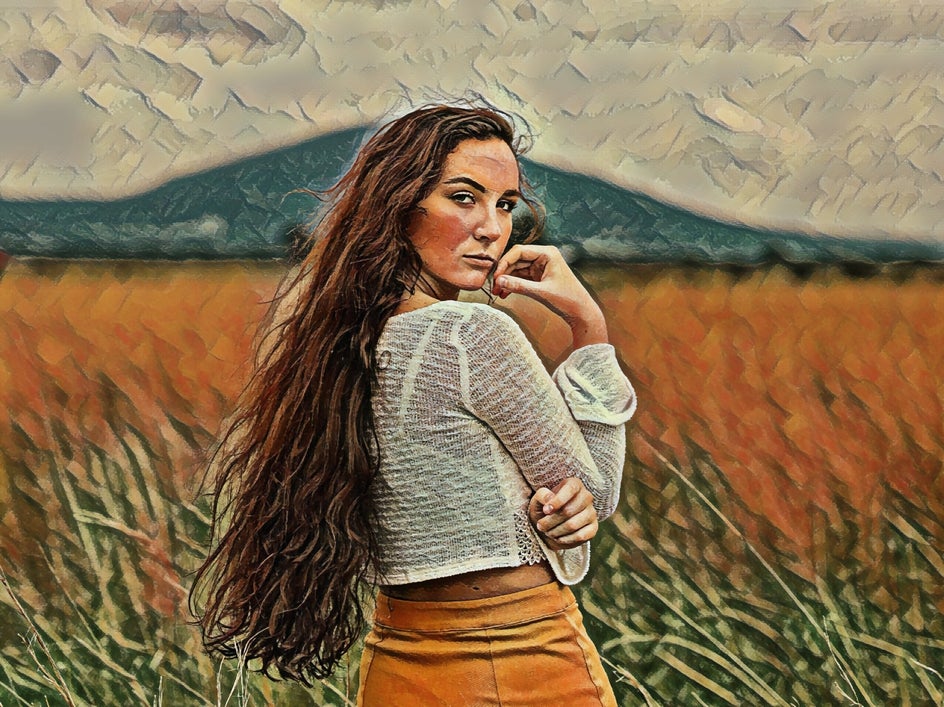 female portrait in field with pastel effect applied