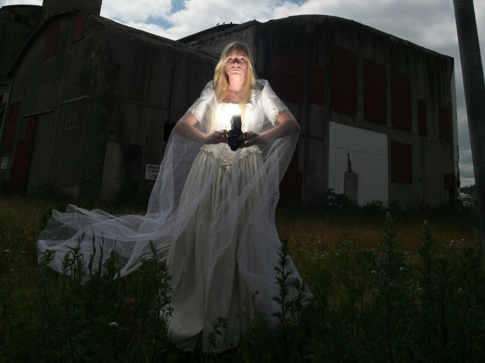 woman in field before scratches effect