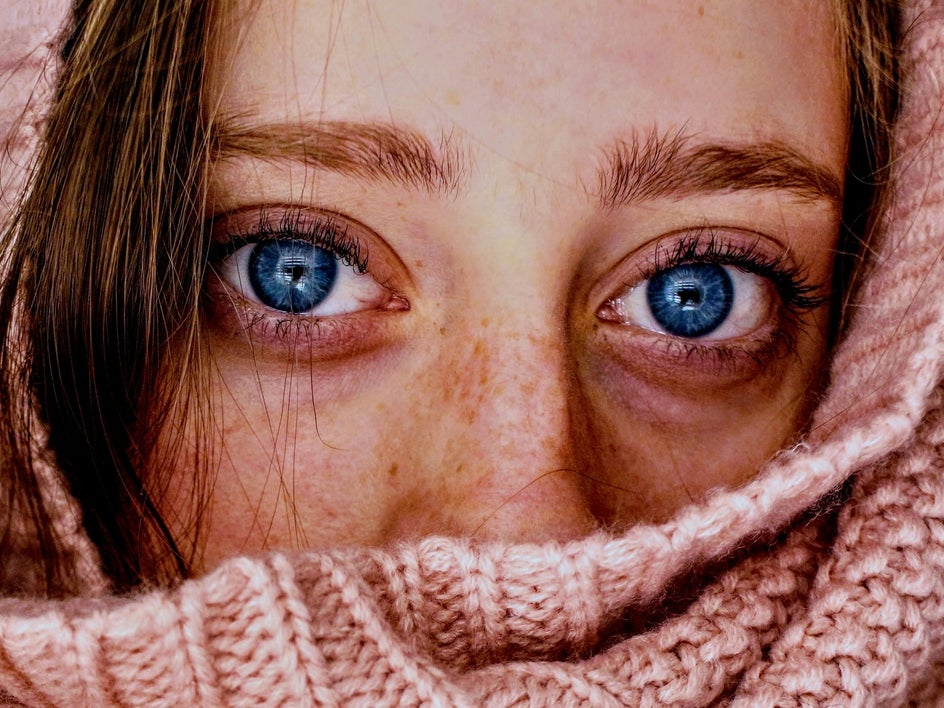 close up of woman with blue eyes