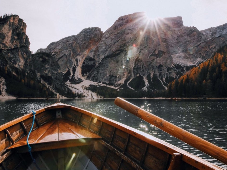 boat in lake with mountains