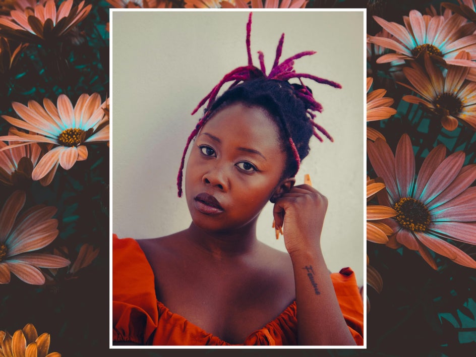 portrait of woman in red with floral background