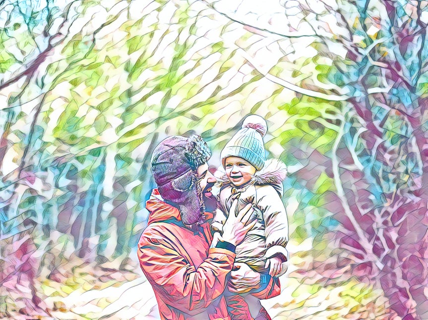 The same scene of a man holding a baby in a forest, transformed with a vibrant watercolor photo filter featuring bright greens, purples, and yellows